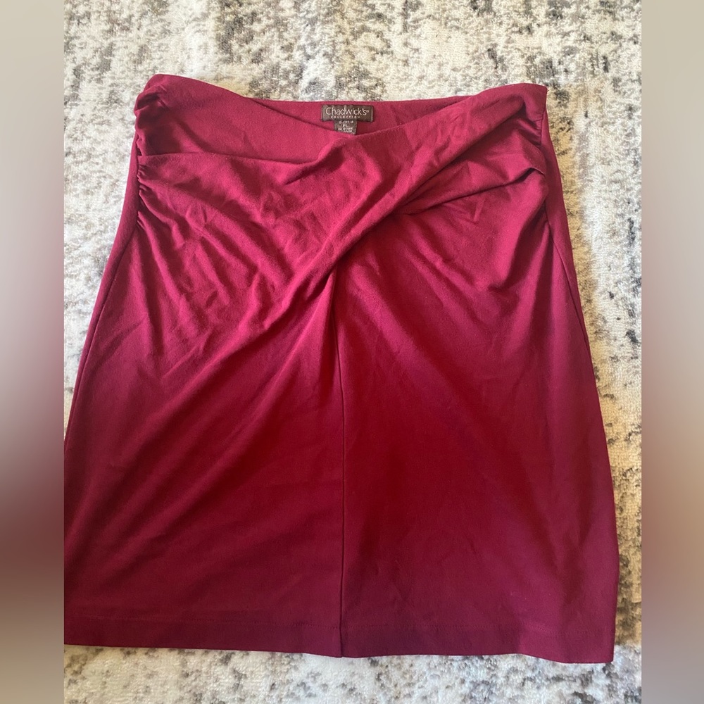 Maroon skirt. Size PL but fit size 13-14